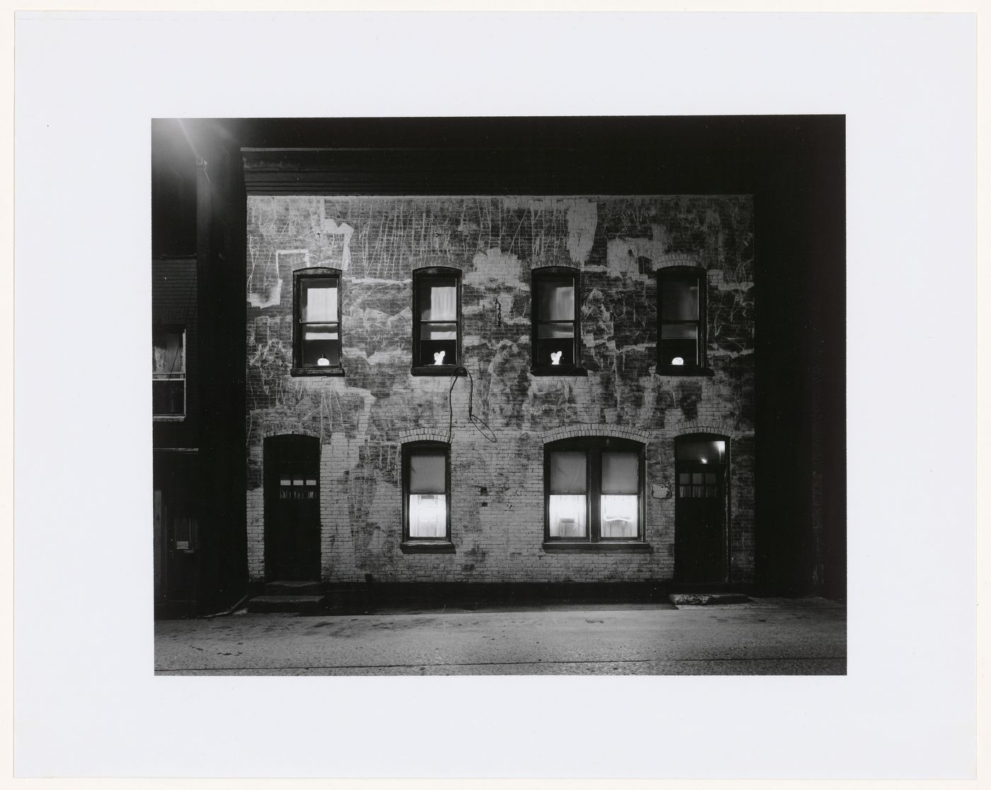 View of a bar with Halloween decorations in the upstairs windows, Phillipsburg, New Jersey, United States