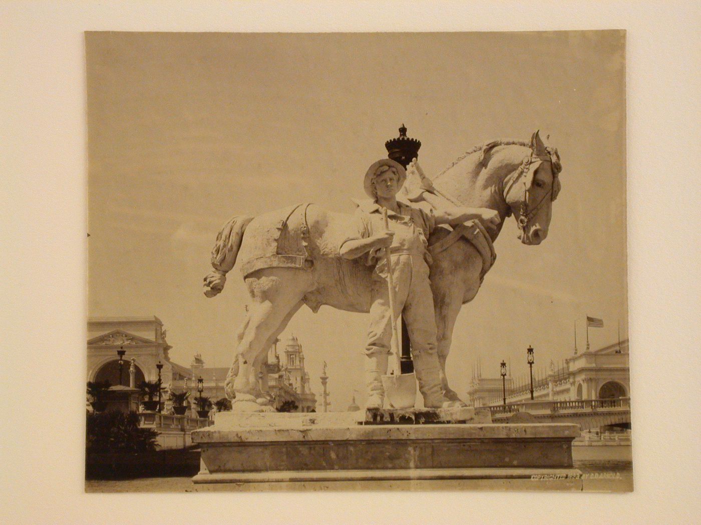 View of a statue of a farmer and a horse with the Machinery Hall in the left background and the Manufacturing and Liberal Arts Building in the right background, 1893 Chicago World's Columbian Exhibition, Chicago, Illinois