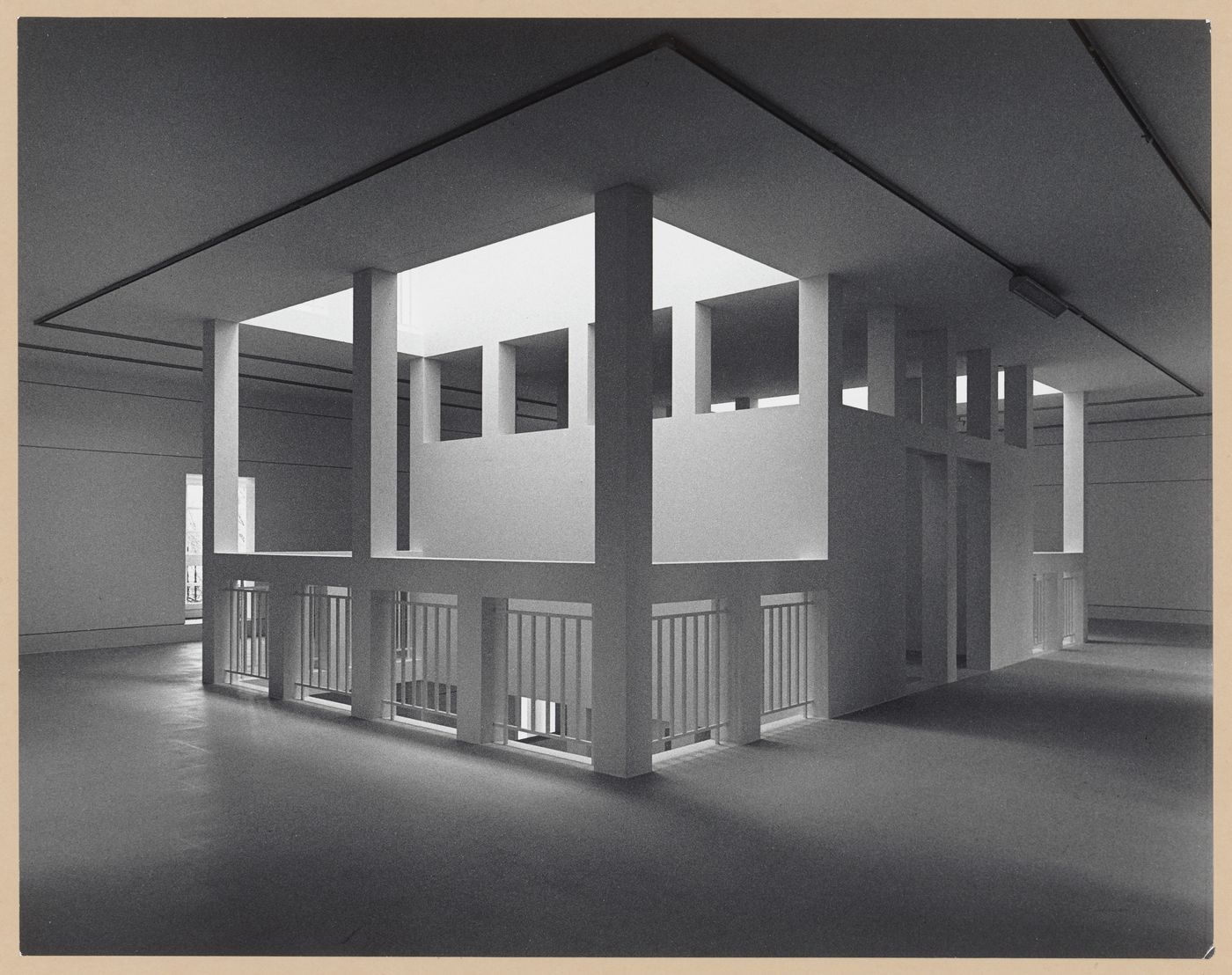 Interior view of the Deutsches Architekturmuseum [German Architecture Museum] showing the principal and lateral façades of the second storey of the House-in-House, light wells and exhibition areas, Schaumainkai 43, Frankfurt am Main, Germany