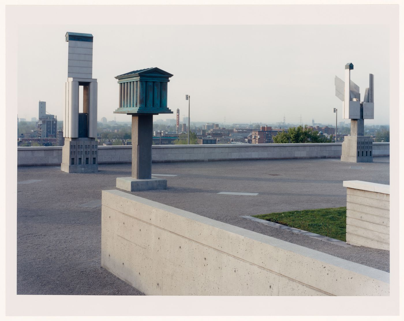 CCA Garden: View of the esplanade showing the allegorical columns, Montréal, Québec, Canada