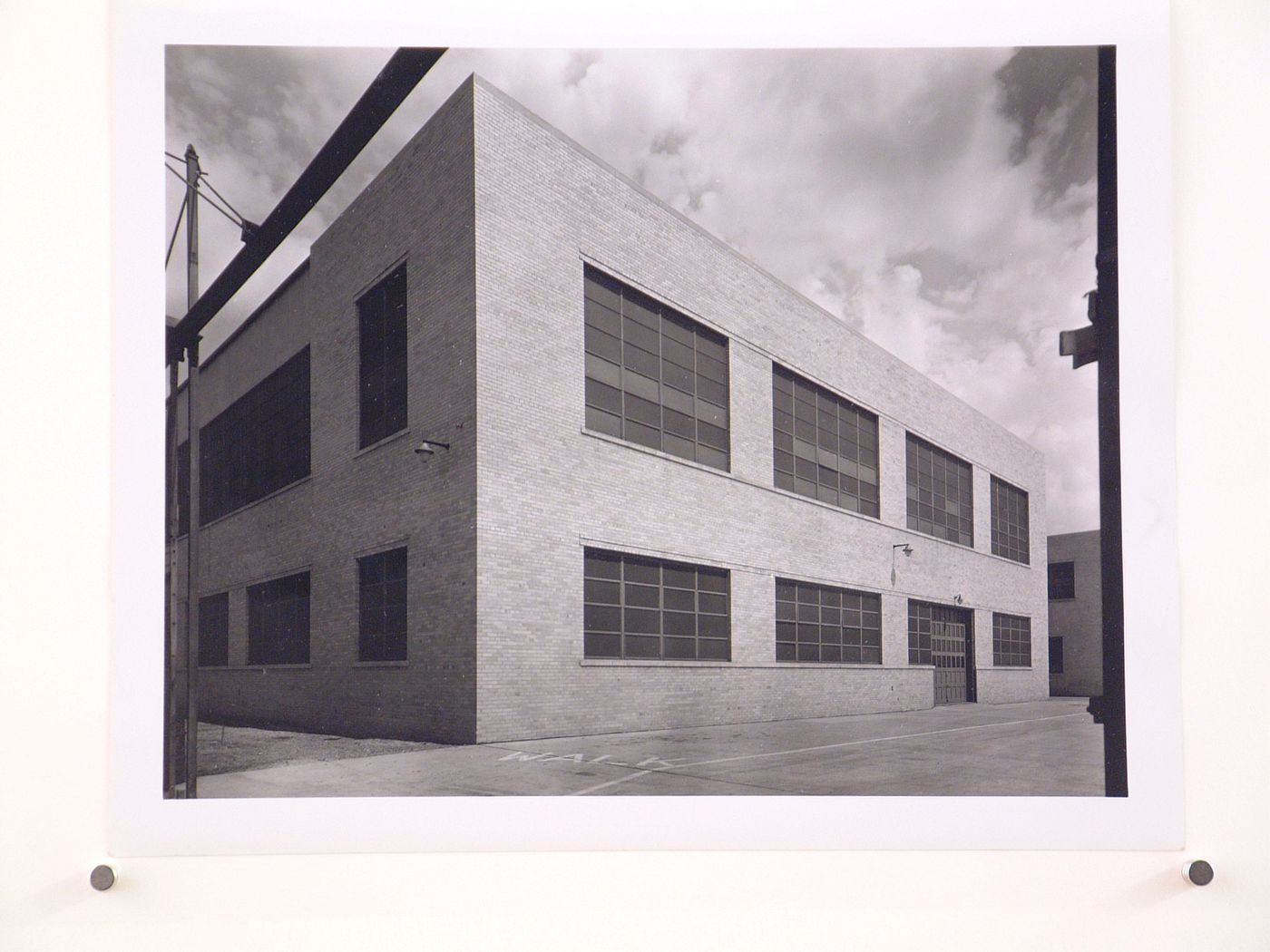 View of the rear [?] façade of the Engineering Garage (also known as Building No. 135), Chrysler Corporation Highland Park Plant, Highland Park, Michigan