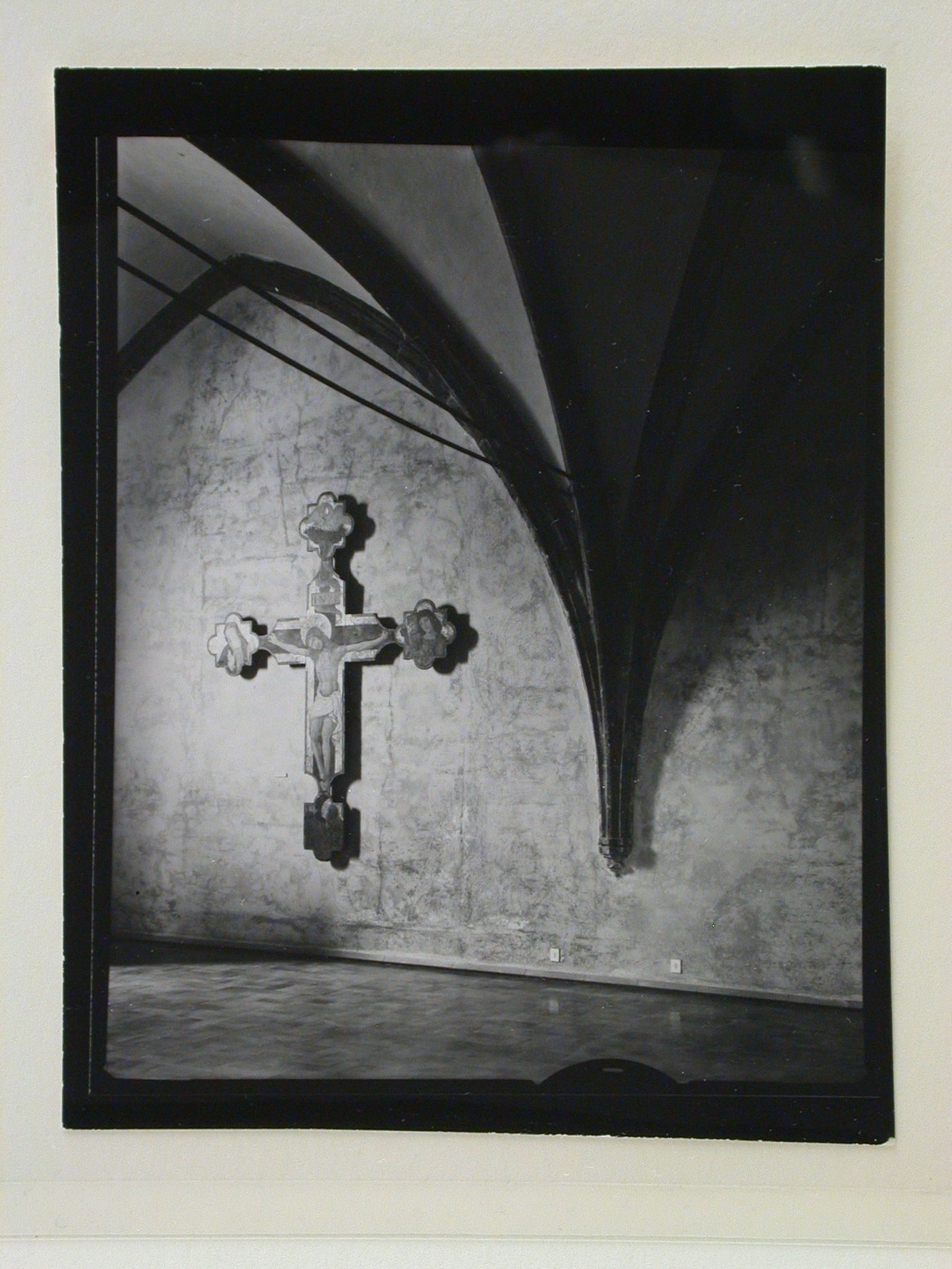 Interior view of a gallery showing a freestanding painted crucifix, Palazzo Abatellis, Galleria regionale della Sicilia, Palermo, Italy