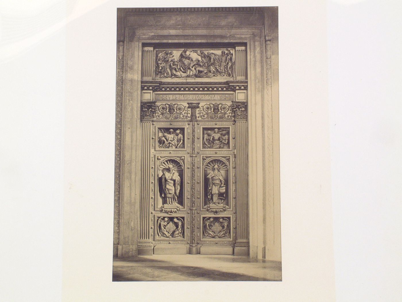 Exterior view of the main bronze entrance doors with bas-reliefs, Saint Isaac's Cathedral, Saint Petersburg, Russia