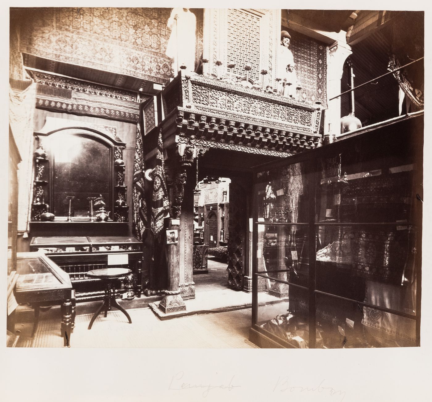 Interior view of a pavilion showing the Bombay exhibit, Calcutta International Exhibition of 1883-1884, India