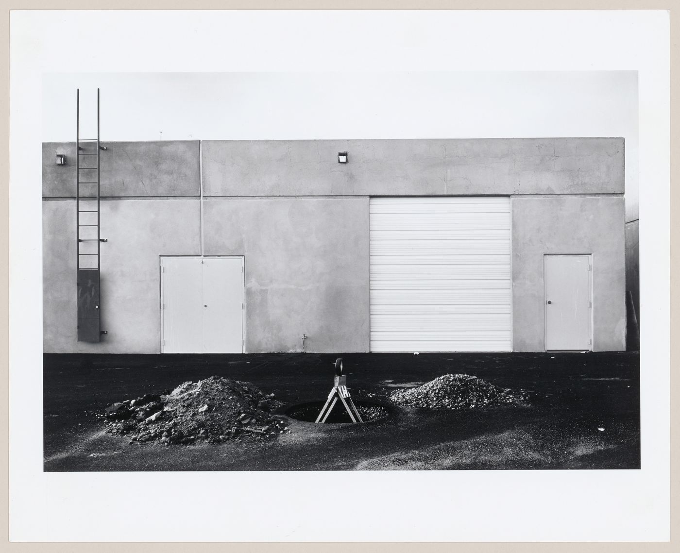 View of road construction near an unidentified building on Airport Loop Drive, Costa Mesa, California, United States, from the series “The new Industrial Parks near Irvine, California”