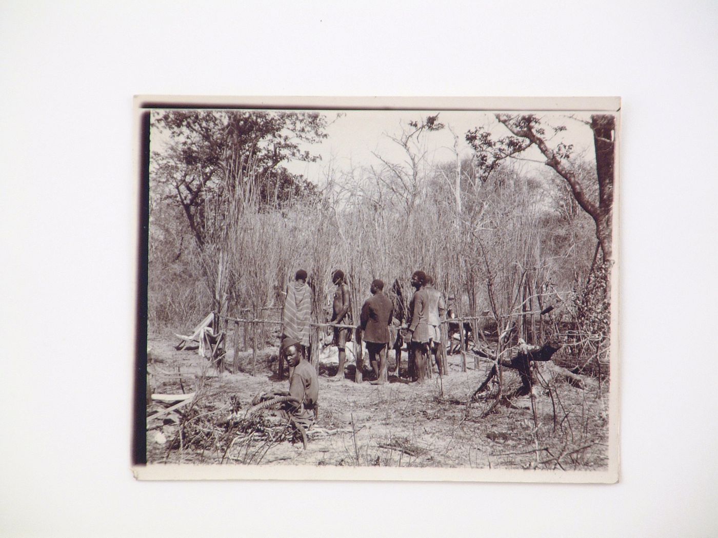 View of a group of men, near Zambezi River