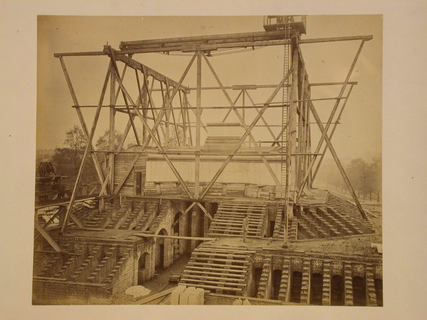 View of the Albert Memorial construction site showing the central podium, stairs, and undercroft, Hyde Park, London, England