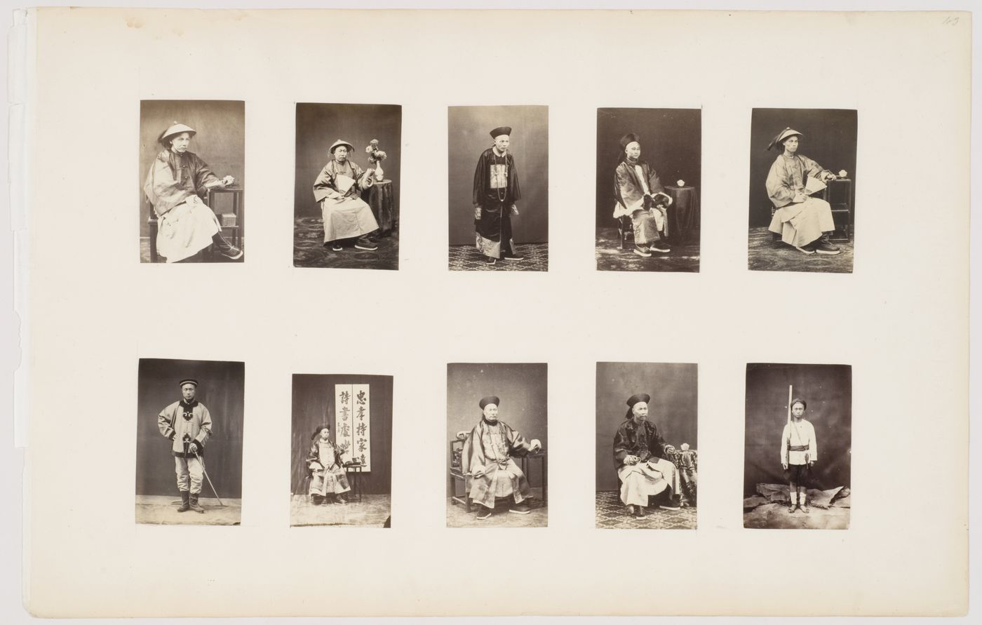 Portrait of a Chinese man seated beside a stand