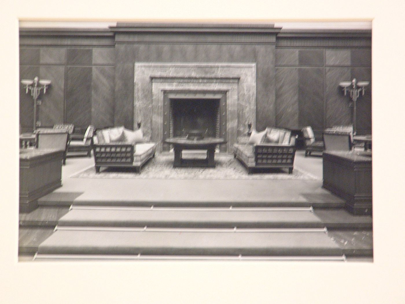 Interior Of A Large Living Room With Marble Fireplace With Three