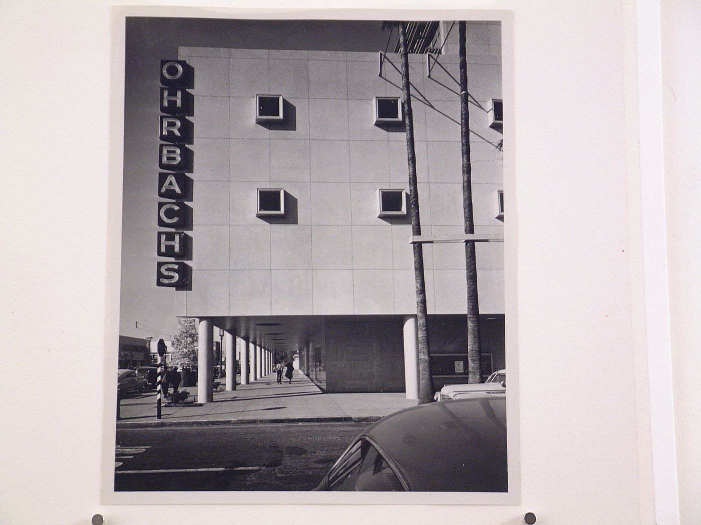 Partial view of the Prudential Insurance Co. building showing Ohrbach's sign, Los Angeles, California, United States