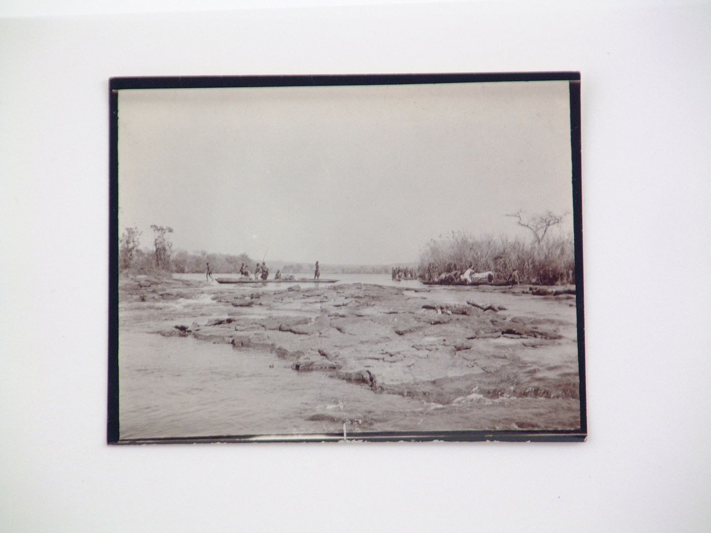 View of a group of people in mokoro (wooden dugout canoe) boats, Zambezi River