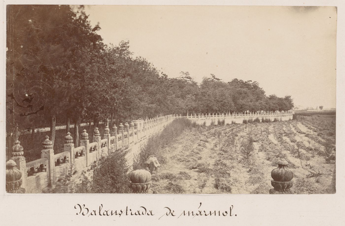 View of the marble balustrade on the shore of Kunming Lake, Garden of the Clear Ripples [Qing Yi Yuan] (now known as the Summer Palace or Yihe Yuan), Peking (now Beijing), China