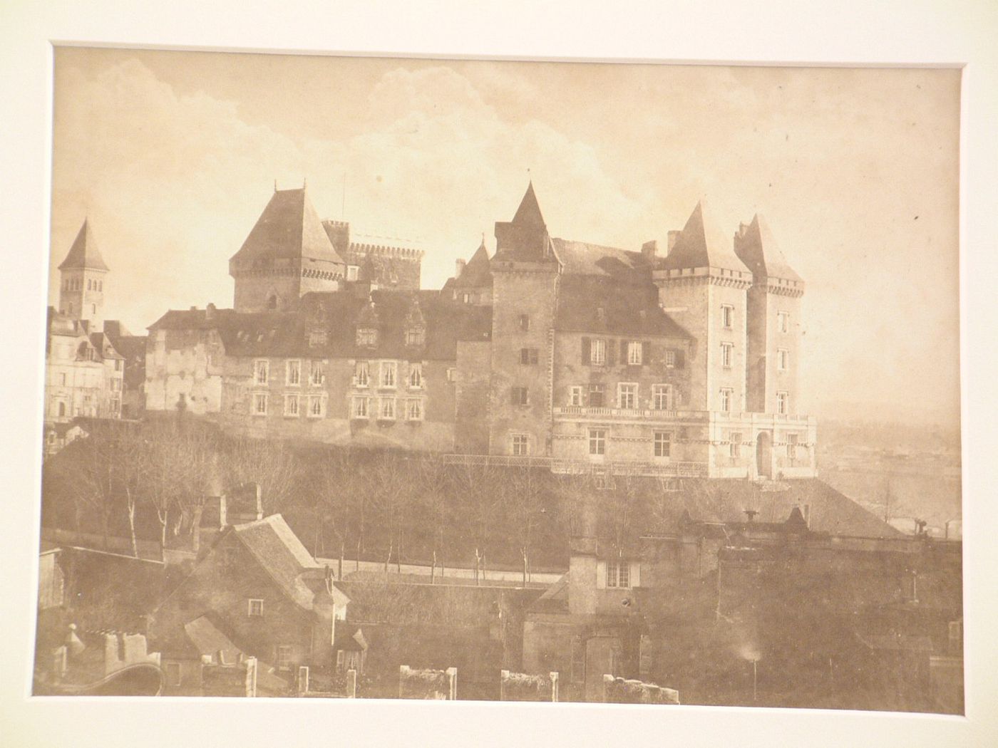 General view of Château with church in background, houses in foreground, Pau, France