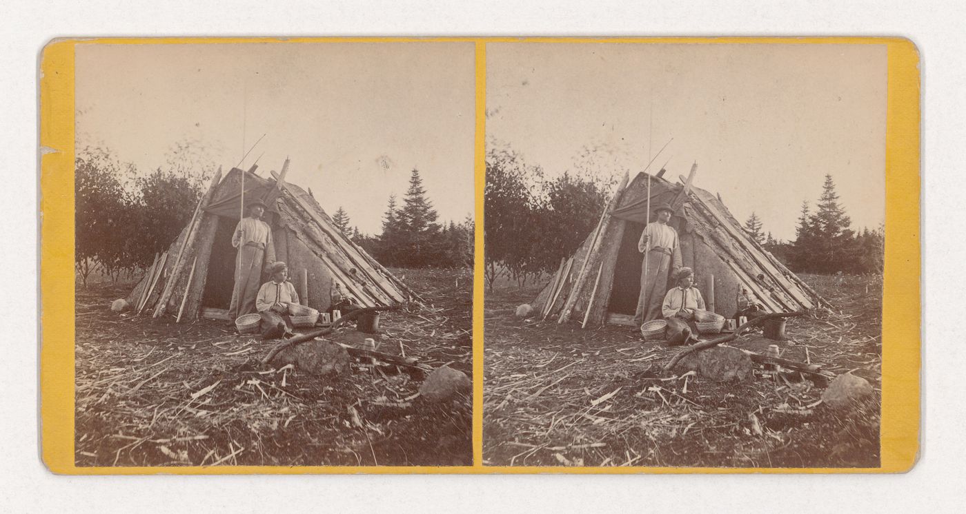 Stereographic view of two Mi'kmaq people in European clothing positioned in front of a wigwam, New Brunswick, Canada