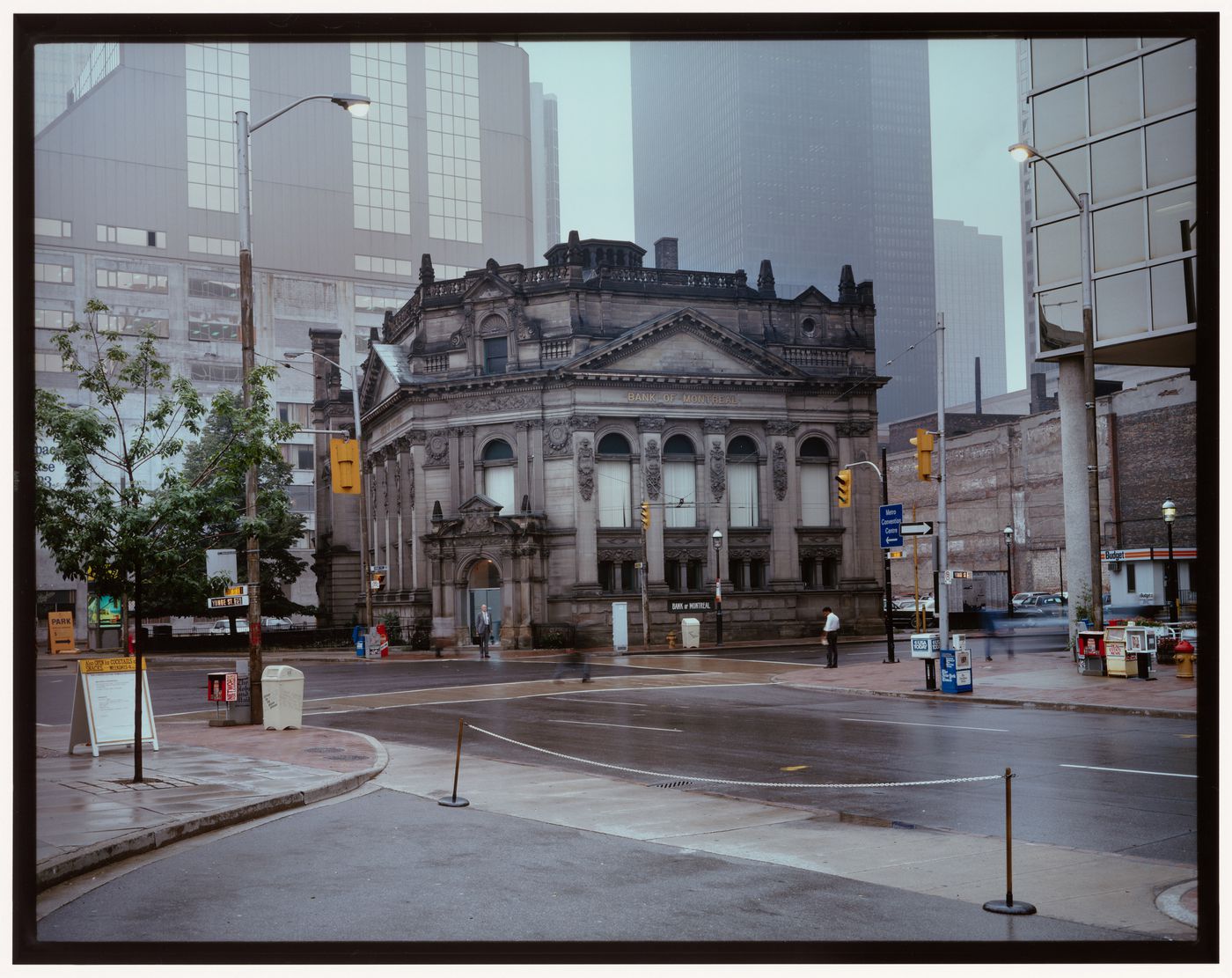 Main façade, Bank of Montréal, northwest corner of Front and Yonge Streets, [early morning], Toronto, Ontario