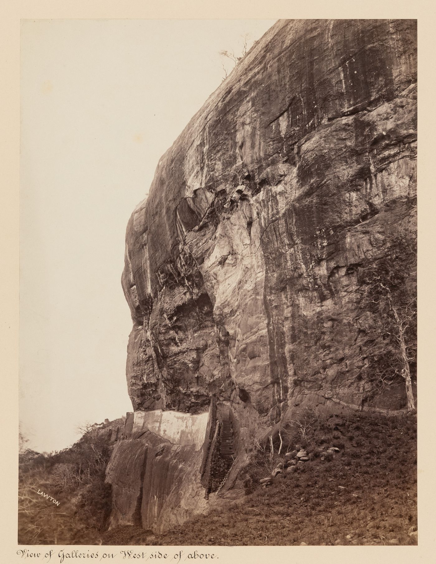 View of the west façade of Sigiriya showing a ladder, staircase and passage, Ceylon (now Sri Lanka)