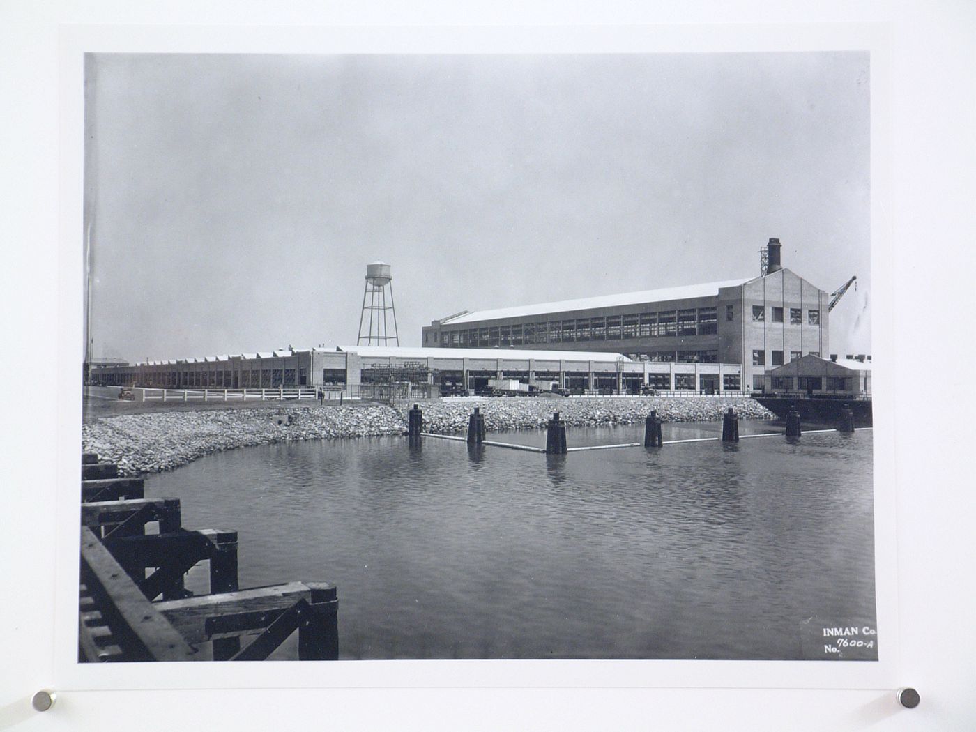 View of the south and east façades of the Assembly Building from the railroad bridge, Ford Motor Company Automobile Assembly Plant, Long Beach, California