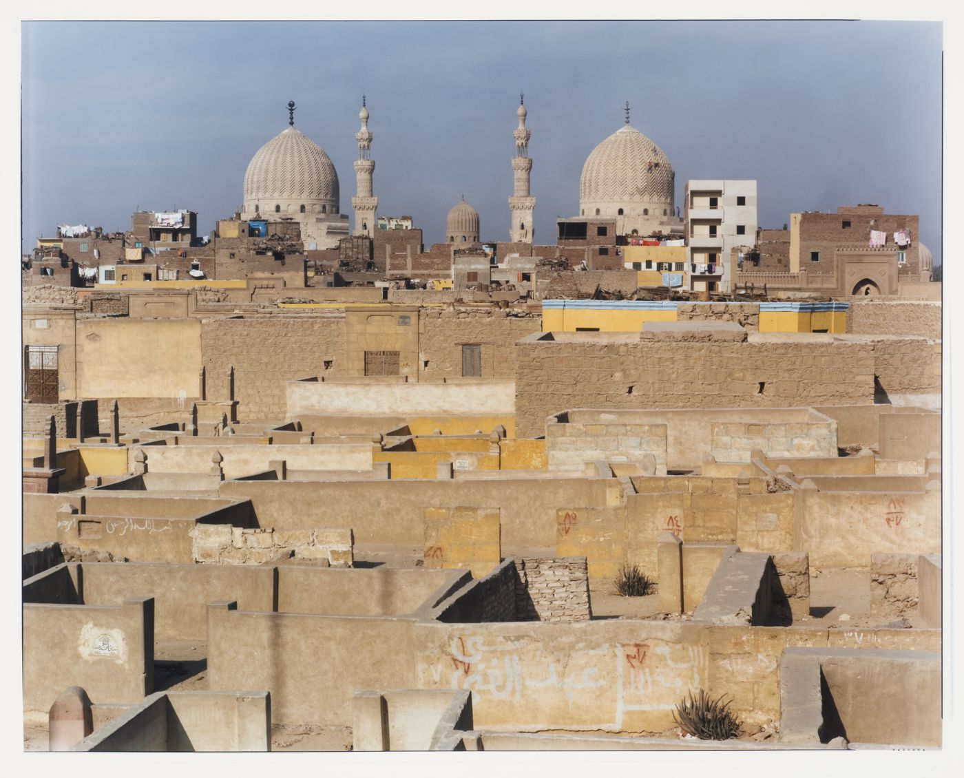 Mausoleum of Sultan Barquq, from the East, with city walls and houses in foreground, Cairo, Egypt