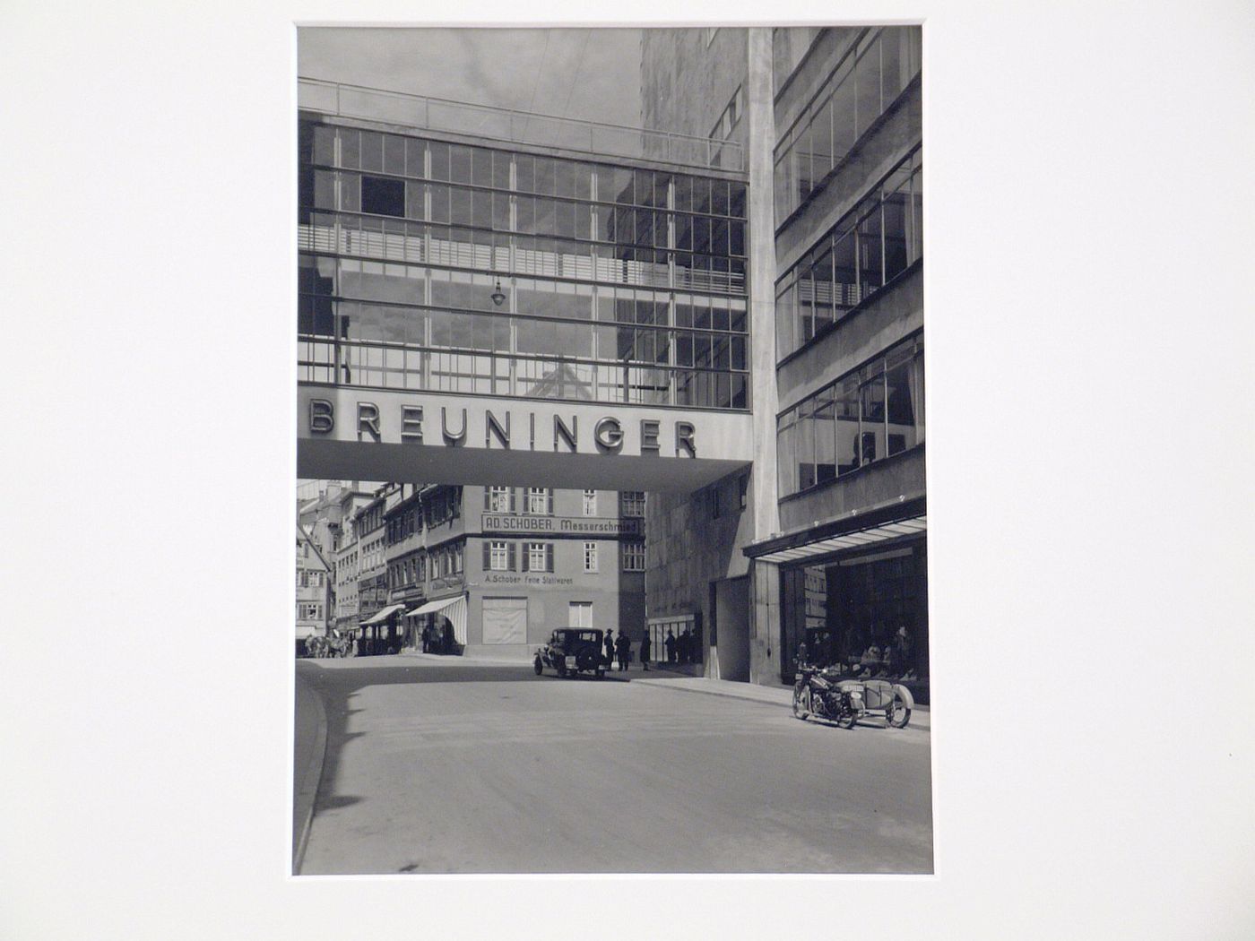 Breuninger, detail of elevated bridge over street linking two buildings, one the Breuninger Department Store, Germany