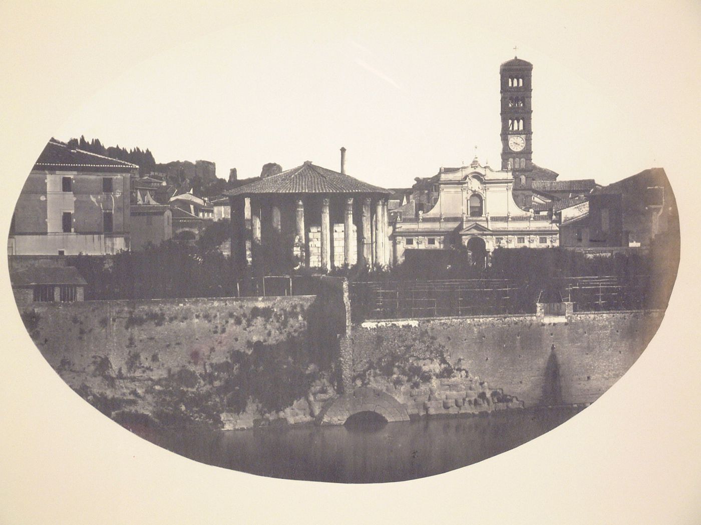 View of the Tempio di Vesta, the Church of Santa Maria in Cosmedin, and the Cloaca Maxima, Rome, Italy
