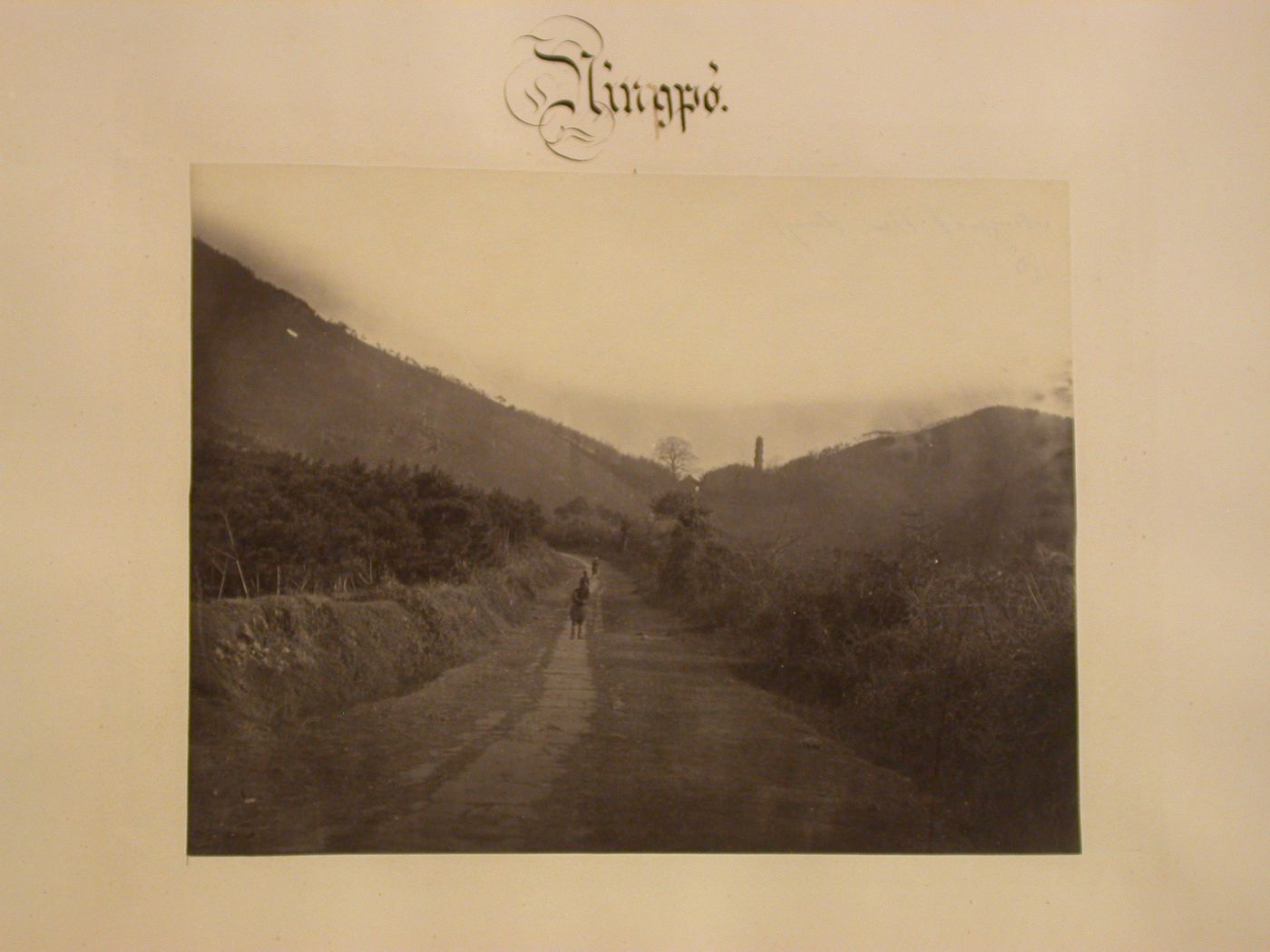 View of a road in a valley with a pagoda in the background, near Ningpo (now Ningbo Shi), Cheh-kiang Province (now Zhejiang Sheng), China