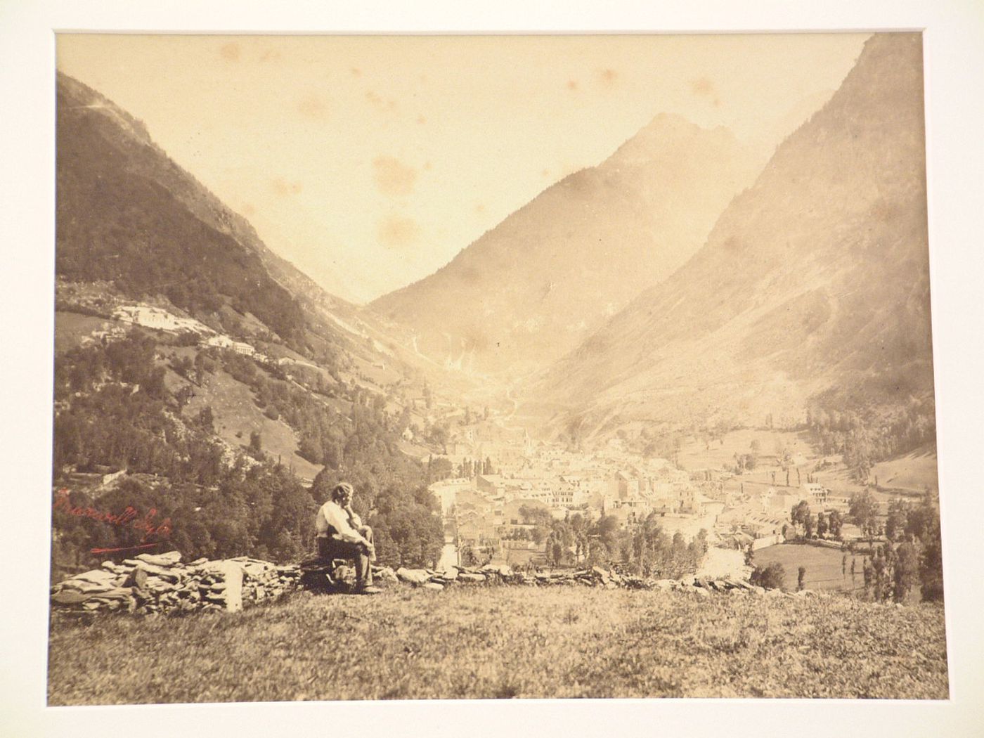 A seated figure over looking valley and towns, Cauterets, France