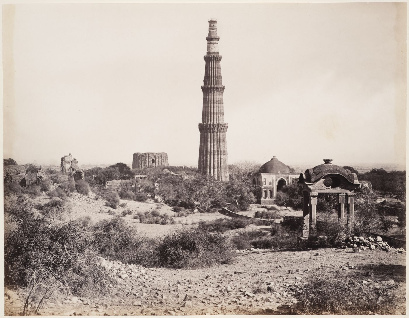 View of the Qutb Minar, 'Ala'i Darvaza [Lofty Gate], 'Ala'i Minar and ruins of a temple, Quwwat al-Islam [Might of Islam] Mosque Complex, Delhi, India