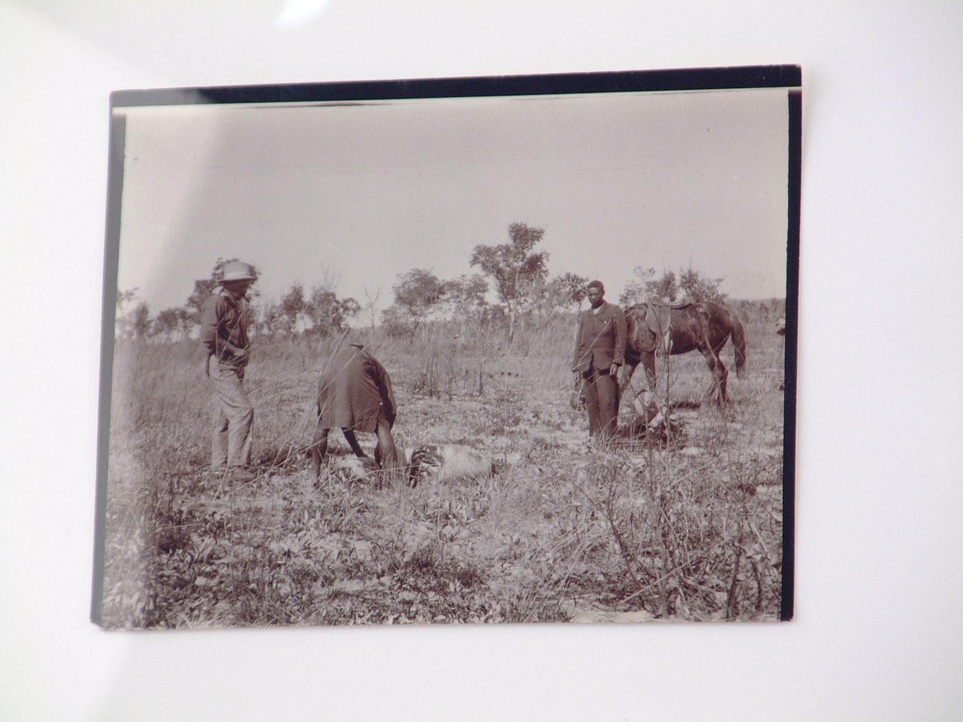 View of men hunting, with horse, near Zambezi River