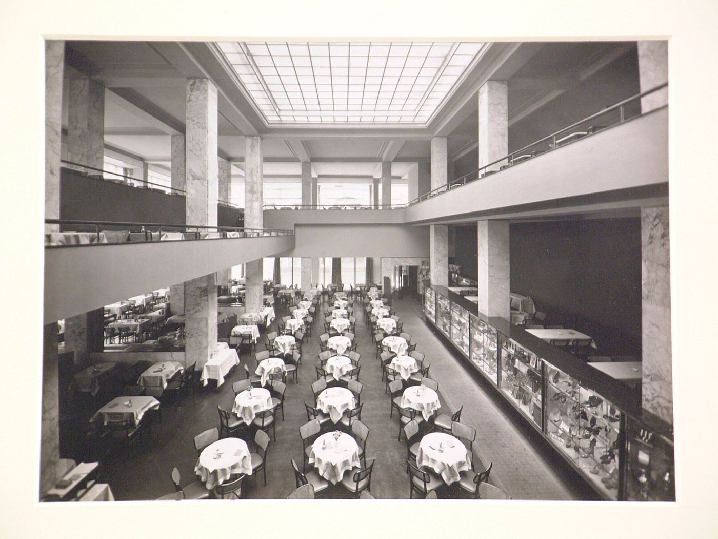 Interior view from balcony of main floor of café Germania, at corner of Hohe strasse and Gurzenichstrasse, Cologne, Germany