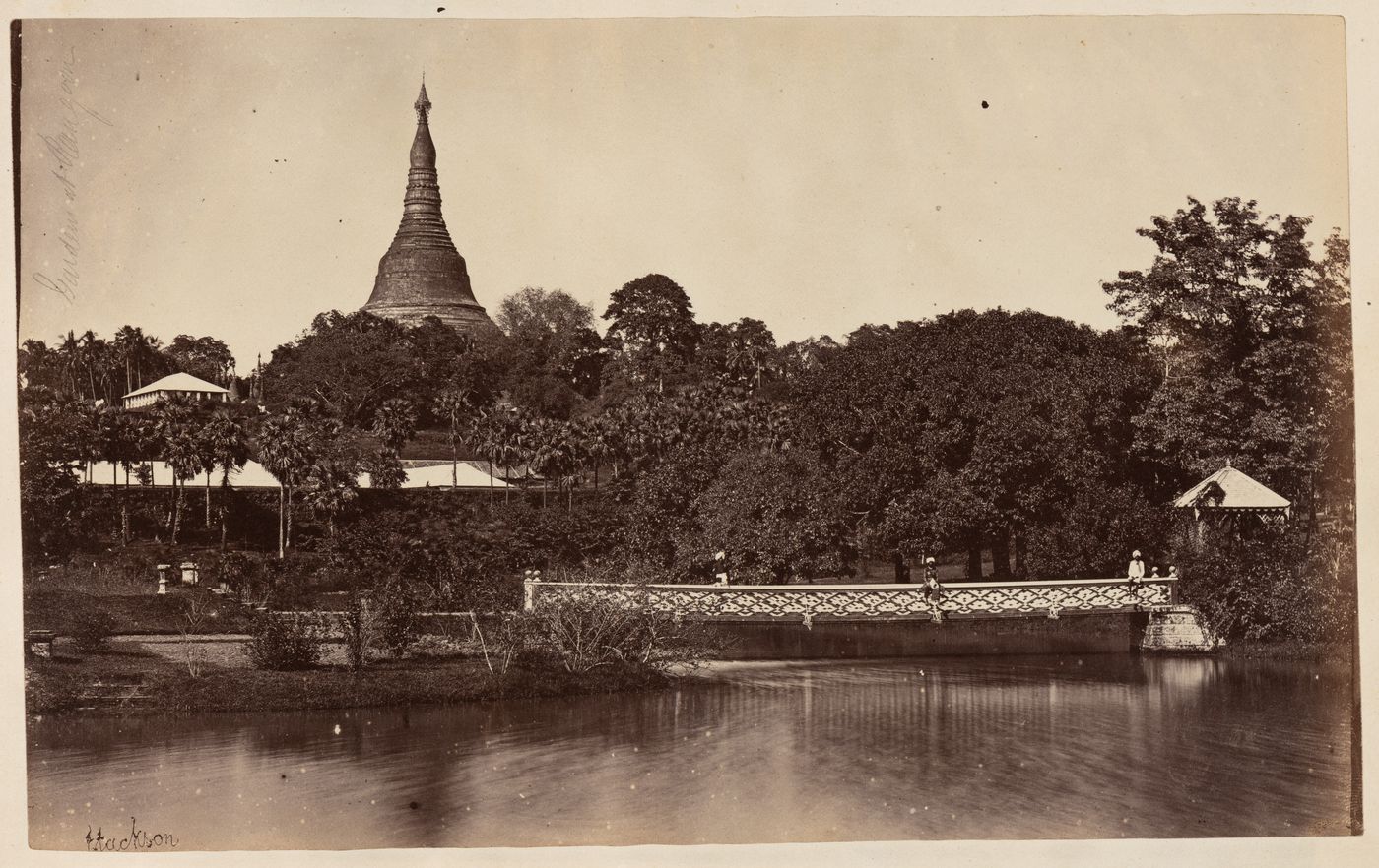 View of the Royal Lakes and Dalhousie Gardens with the Shwedagon Pagoda in the background, Rangoon (now Yangon), Burma (now Myanmar)