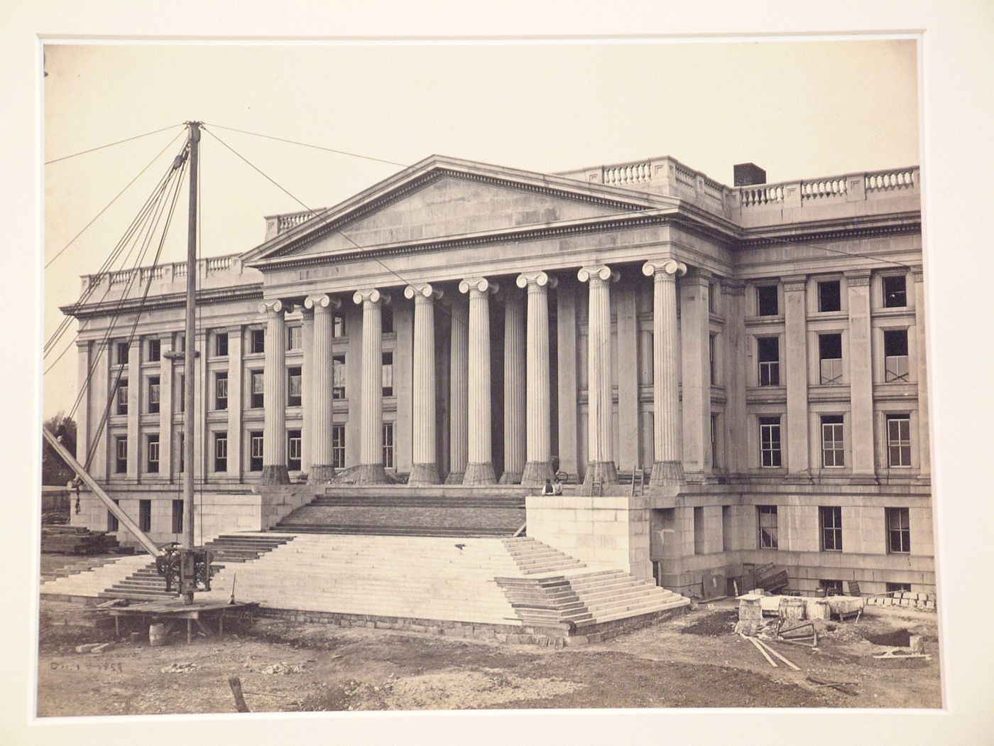 Treasury Building under contruction: Crane and figures out front, Washington, District of Columbia