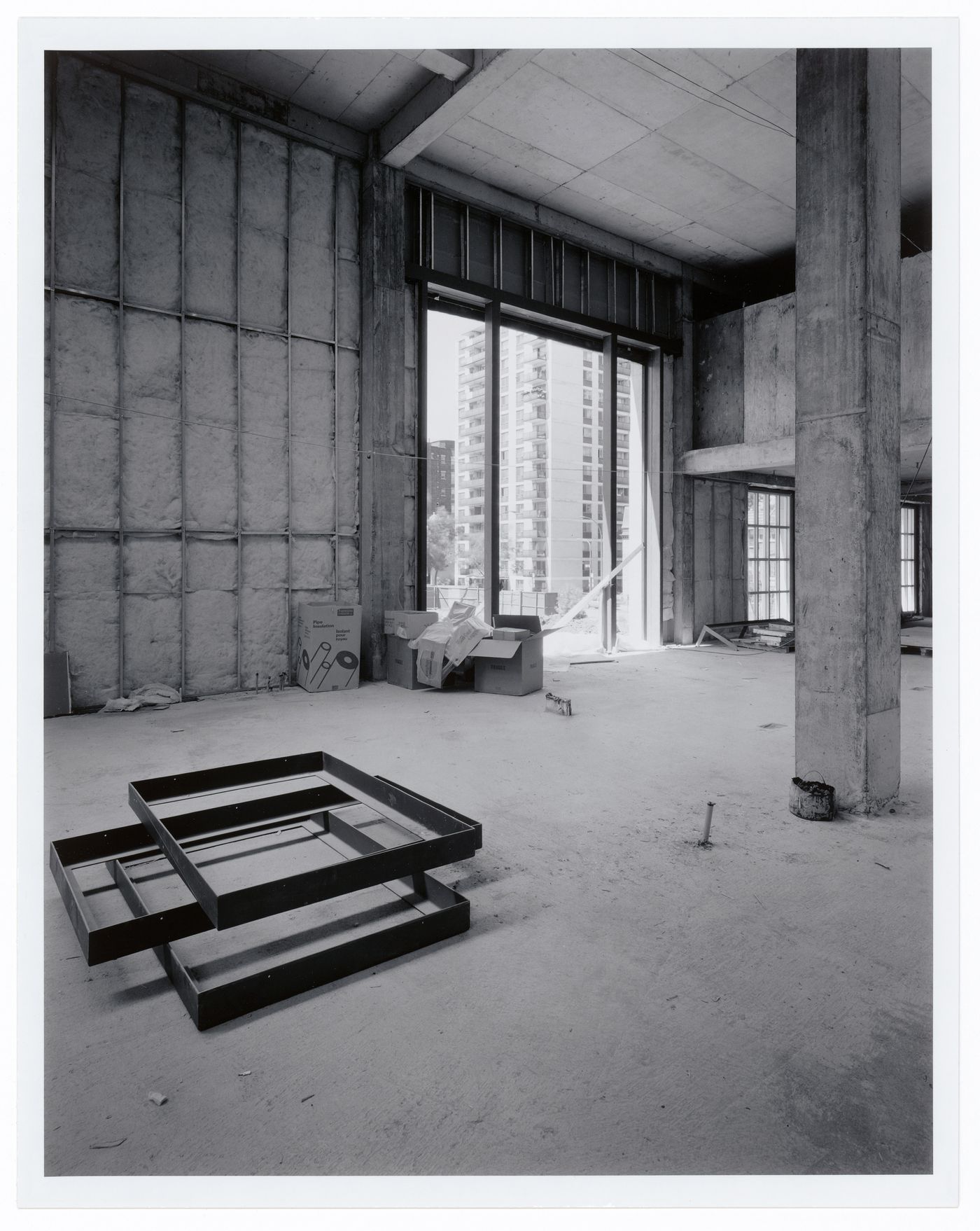 Interior view of the Library showing window frames prior to installation in the foreground, Canadian Centre for Architecture under construction, Montréal, Québec