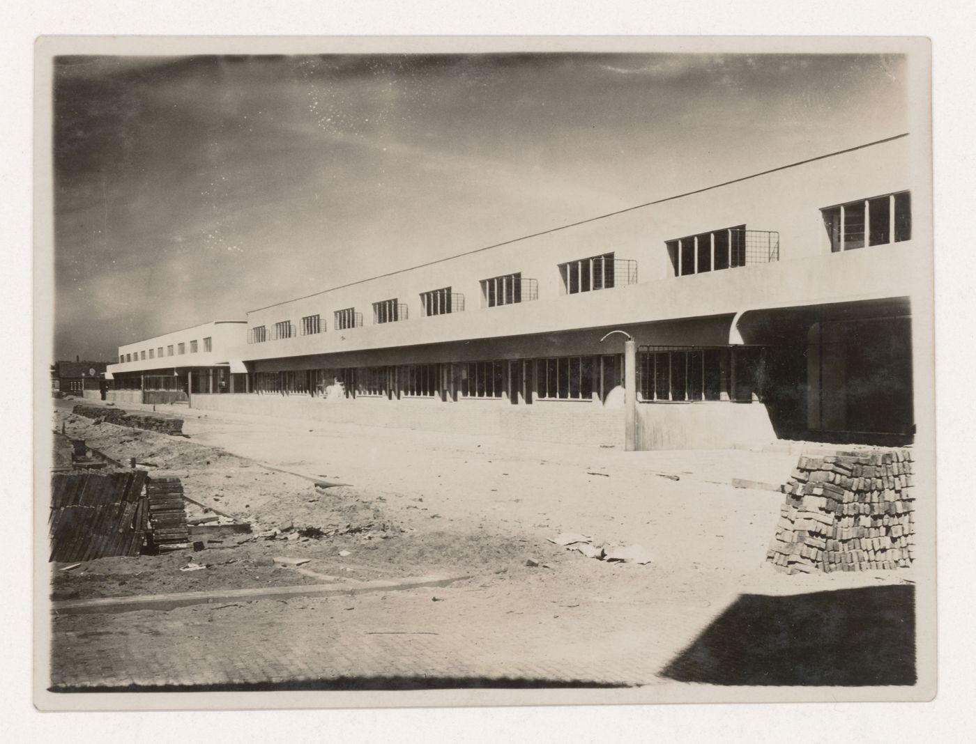 Exterior view of industrial row houses under construction, Hoek van Holland, Netherlands