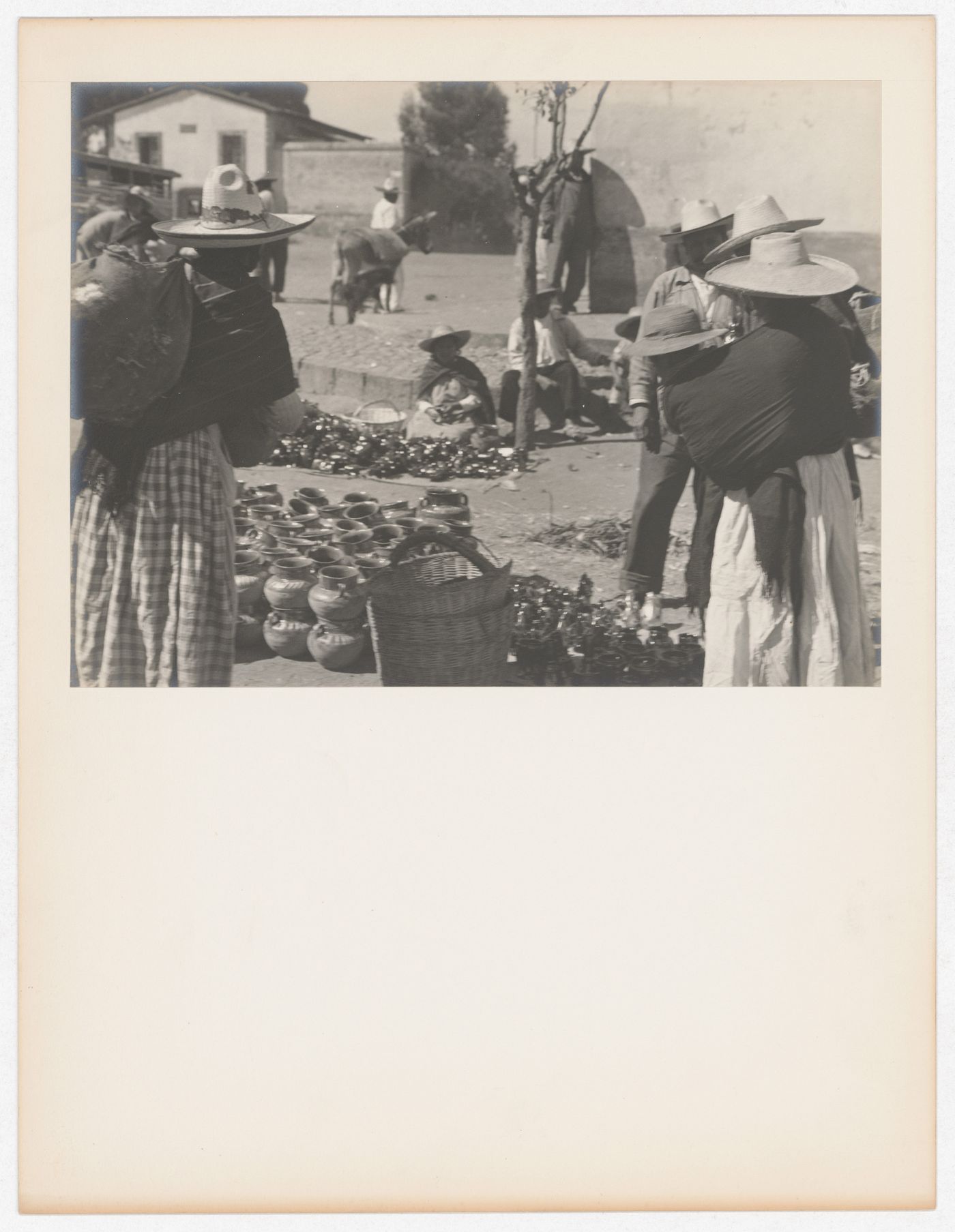 View of a market showing people and dishes, Metepec, Mexico
