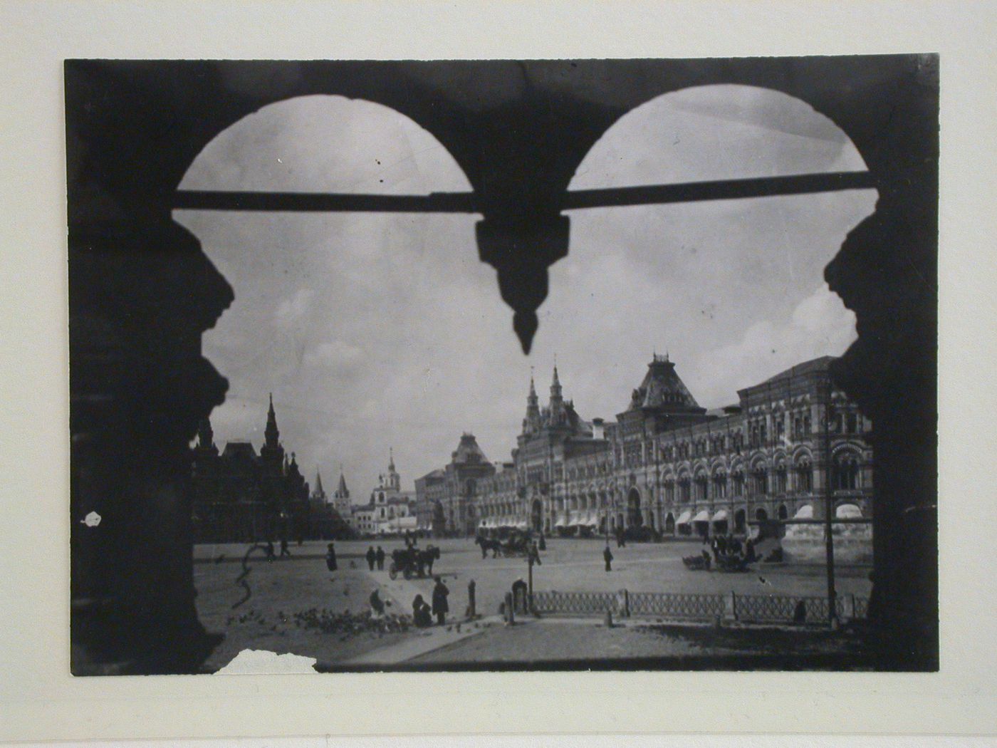 View of Red Square from a window showing the Historical Museum in the background and the Upper Shopping Arcades on the right, Moscow