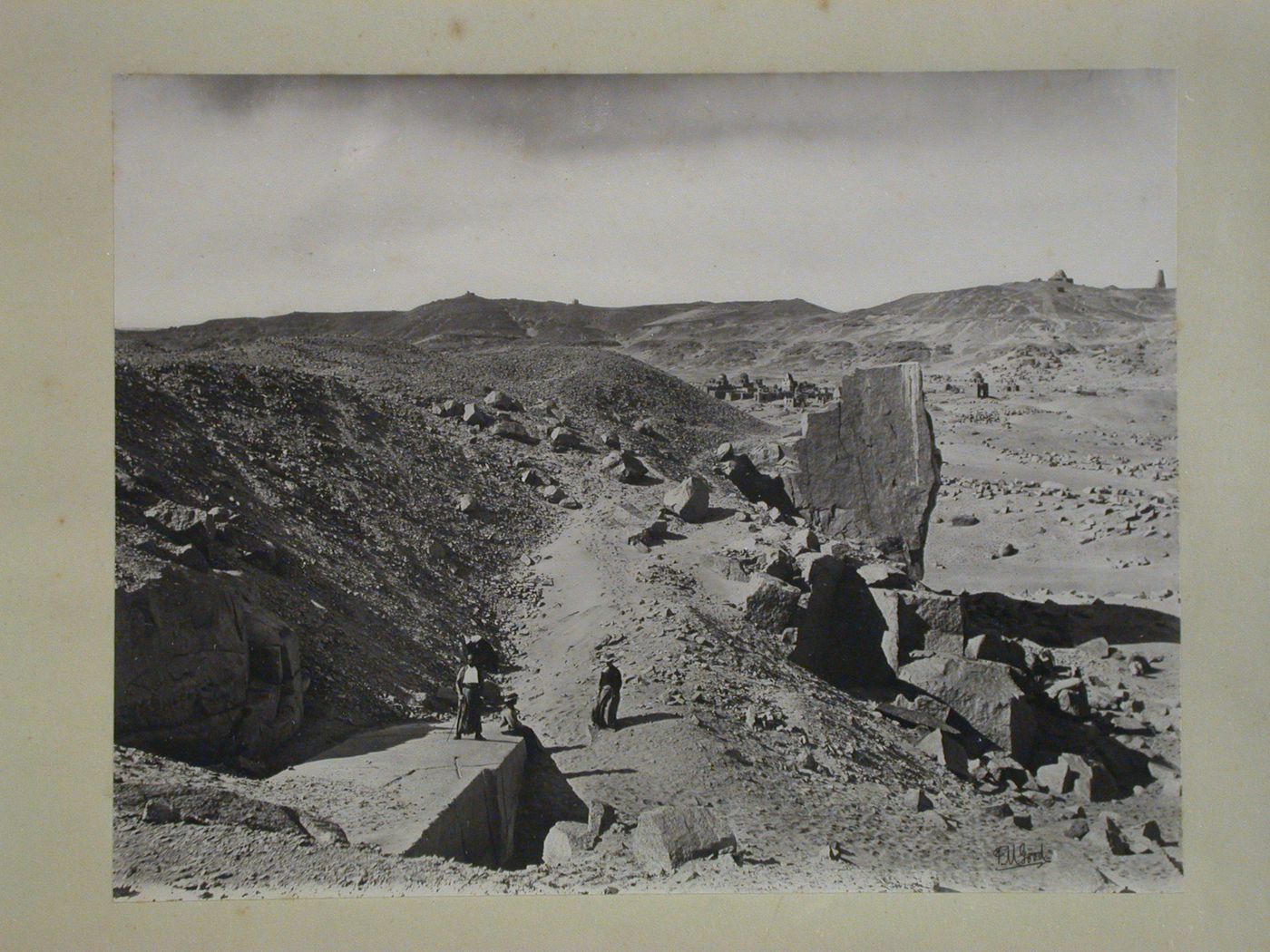 View of unfinished obelisk in foreground with Fatimid Cemetery in the distance, northern quarry, Aswān, Egypt