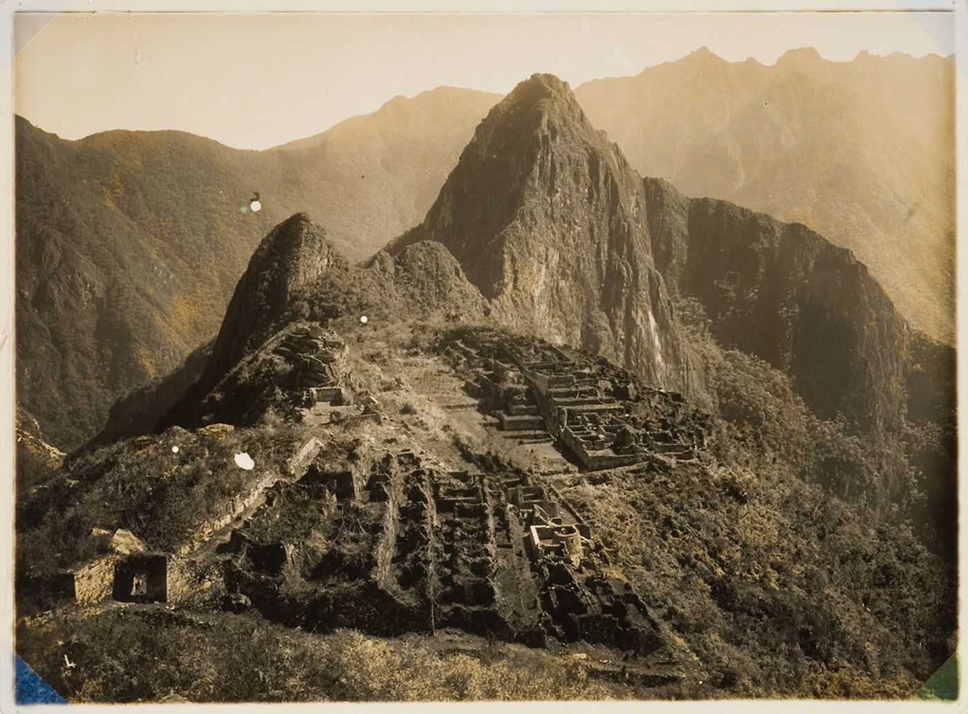 Aerial view of Machu Picchu with mountains in the background, Peru