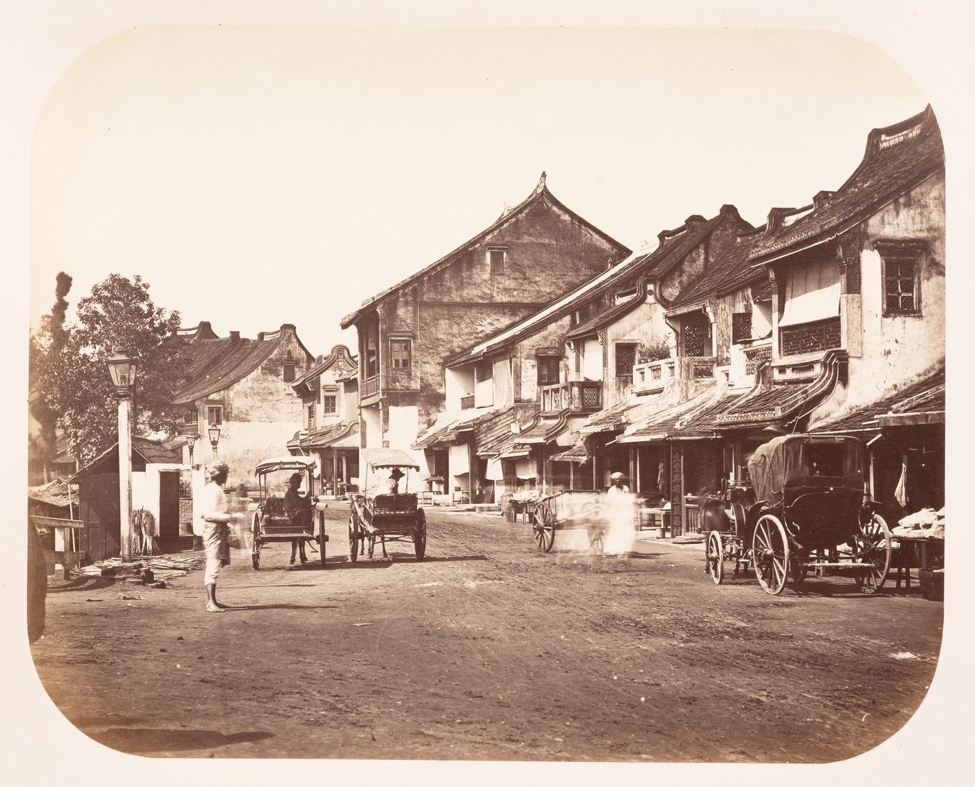 View of buildings and Jalan Pintu Kecil street in Glodok, Batavia (now Jakarta), Dutch East Indies (now Indonesia)