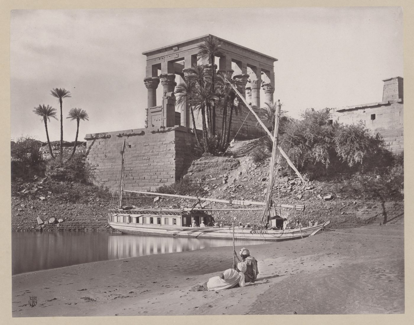 Kiosk of Trajan, rear view from quaiside with dhahabiyah moored in foreground, Philae, Egypt