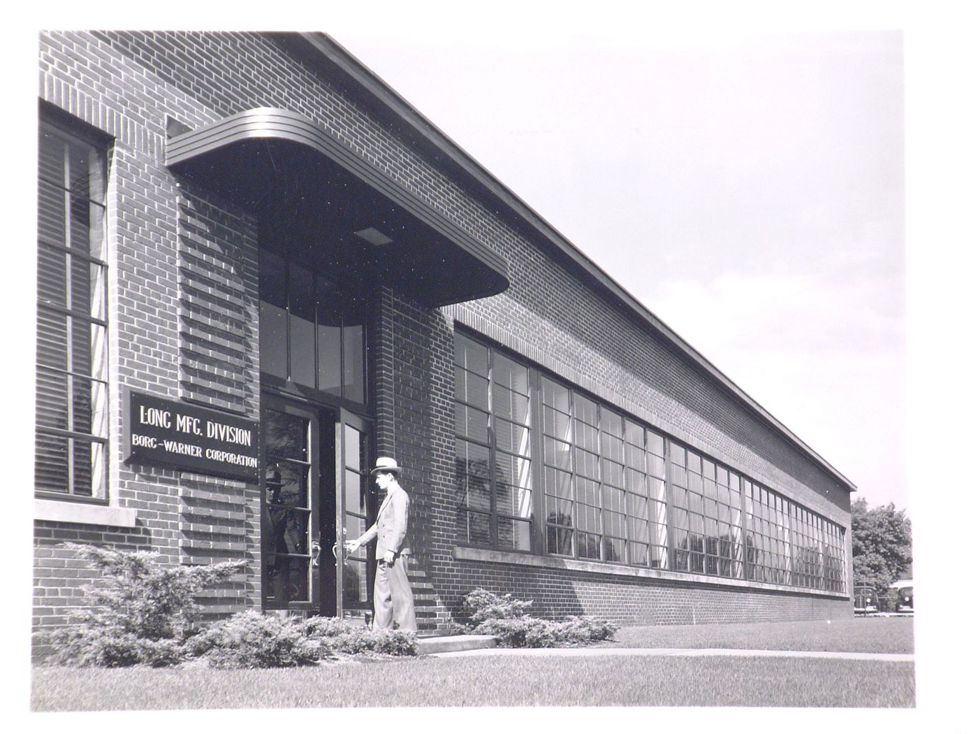 View of the main entrance of the addition to the Administration Building, Borg-Warner Corporation Long Manufacturing Company division Assembly [?] Plant, Detroit, Michigan