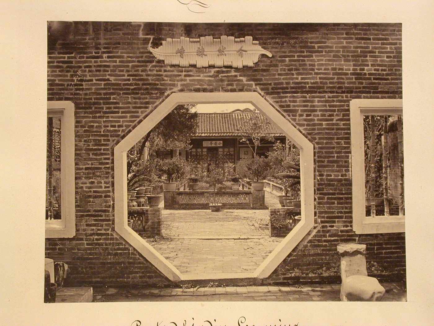 View of Lee-ming-koon Garden through octagonal doorway, Canton (now Guangzhou), Guangdong Province, China