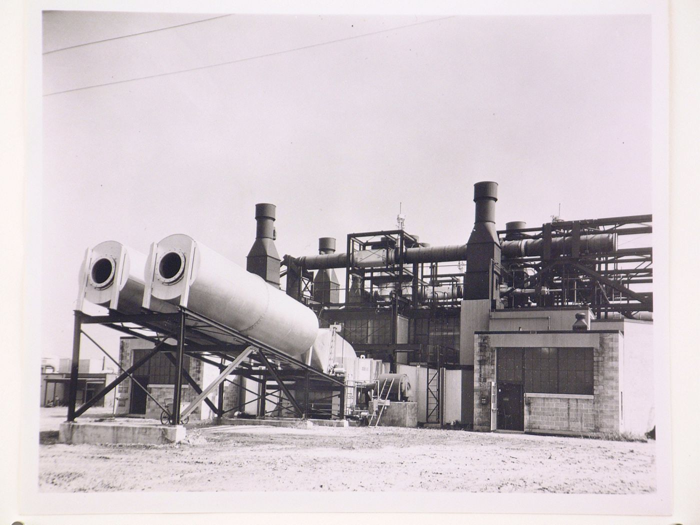 View of Twin Silencers in front of the Development Laboratory, Wright Aeronautical Corporation Airplane Engine Assembly Plant, Wood-Ridge, New Jersey