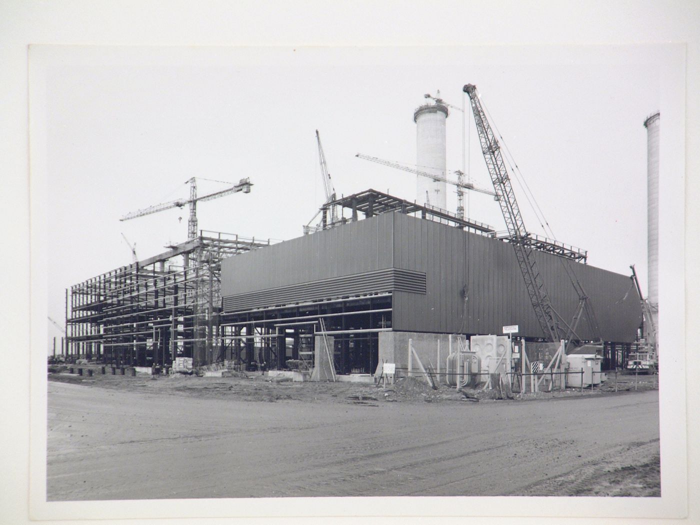 View of cranes and construction of steel structure for power station, United Kingdom