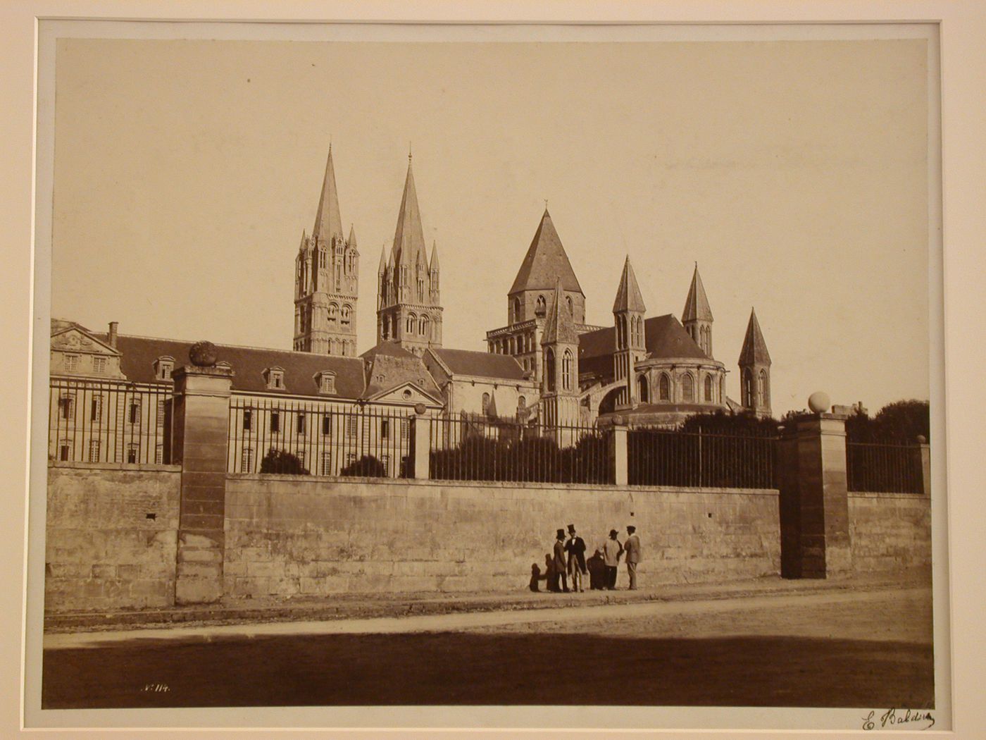 General view from the southeast of Saint-Étienne, with spires visible behind 17th palace of the Abbot at left, Caen, France