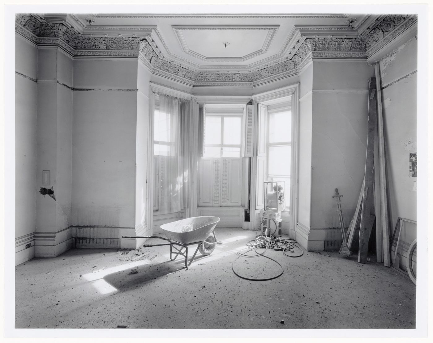 Interior view of the bay windowed drawing room in the west part of Shaughnessy House under renovation, Montréal, Québec