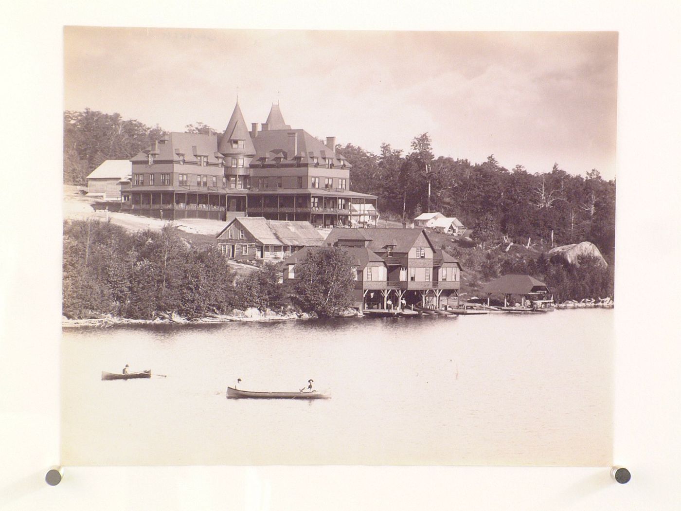 Lake, hotel, and boathouse, probably in New York State
