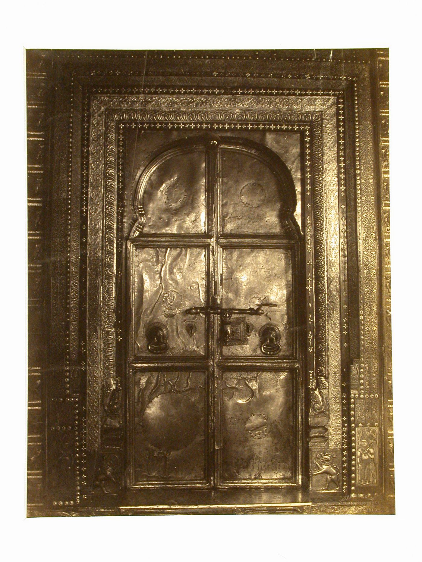 View of temple doors, possibly at the Temple of the Tooth (also known as the Sri Dalada Maligawa), Kandy, Ceylon (now Sri Lanka)