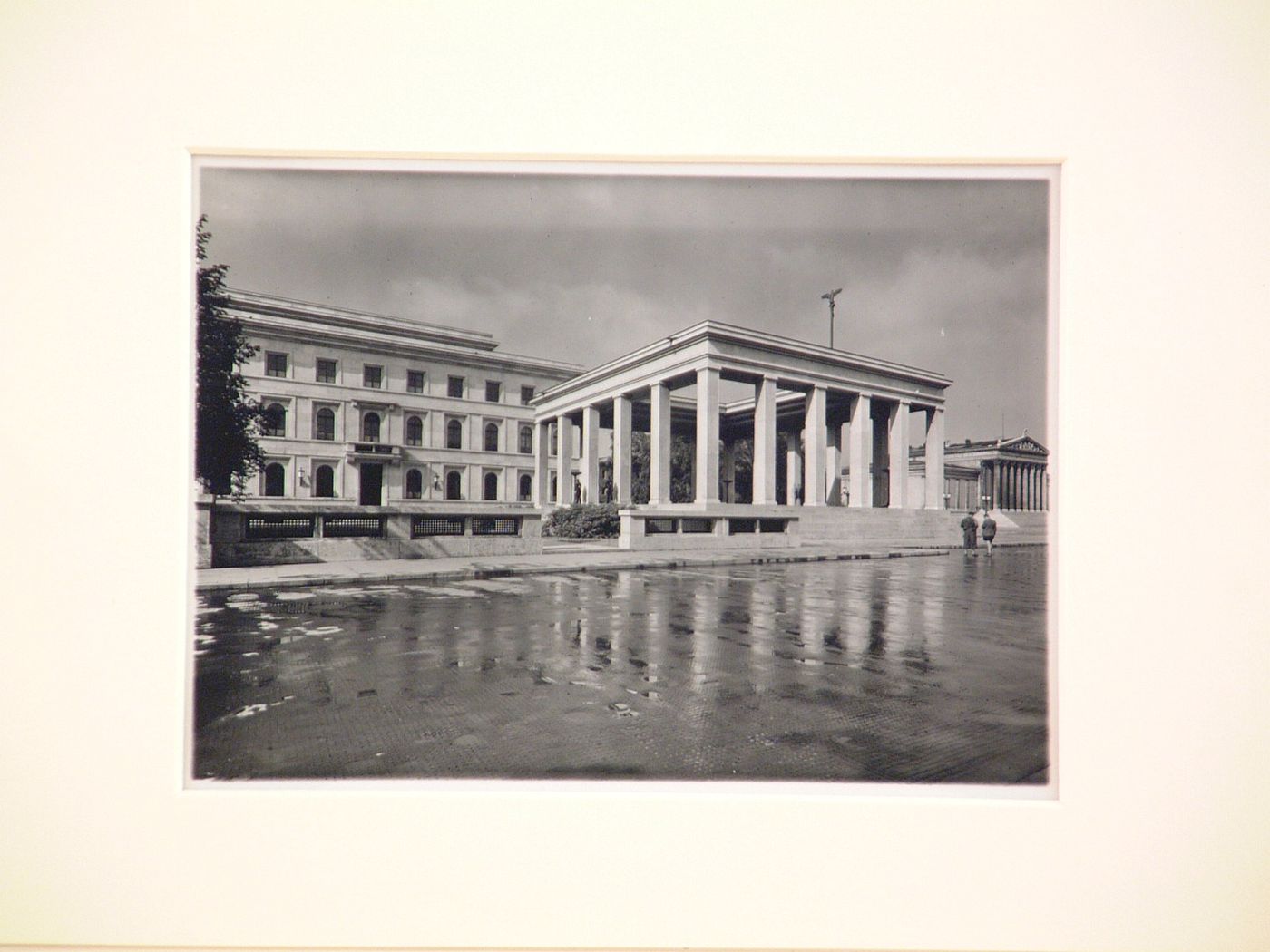 Exterior view, from a distance, of open-roofed neoclassical memorial structure, Munich, Germany