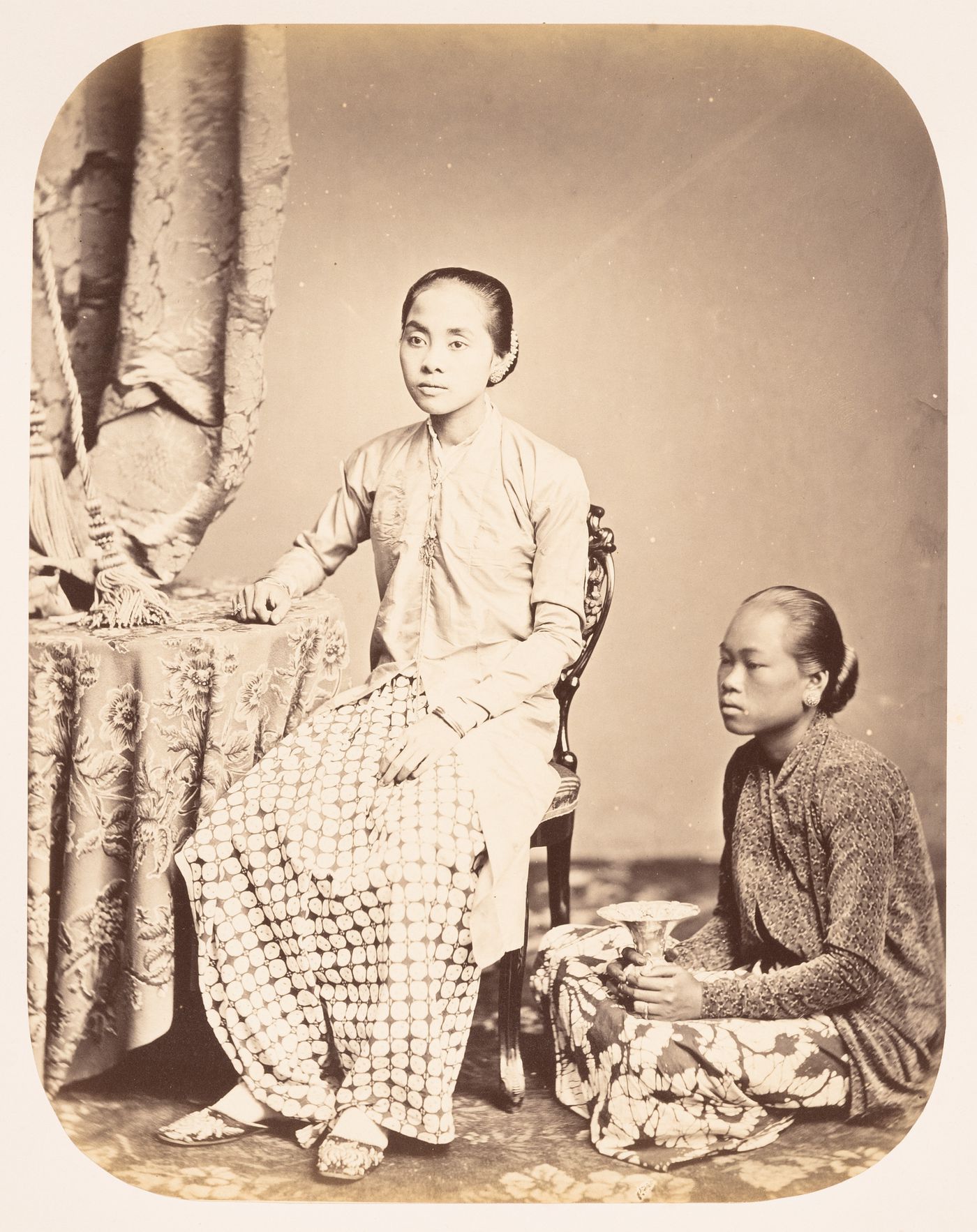 Group portrait of Raden Saleh's second wife and her attendant, Batavia (now Jakarta), Dutch East Indies (now Indonesia)