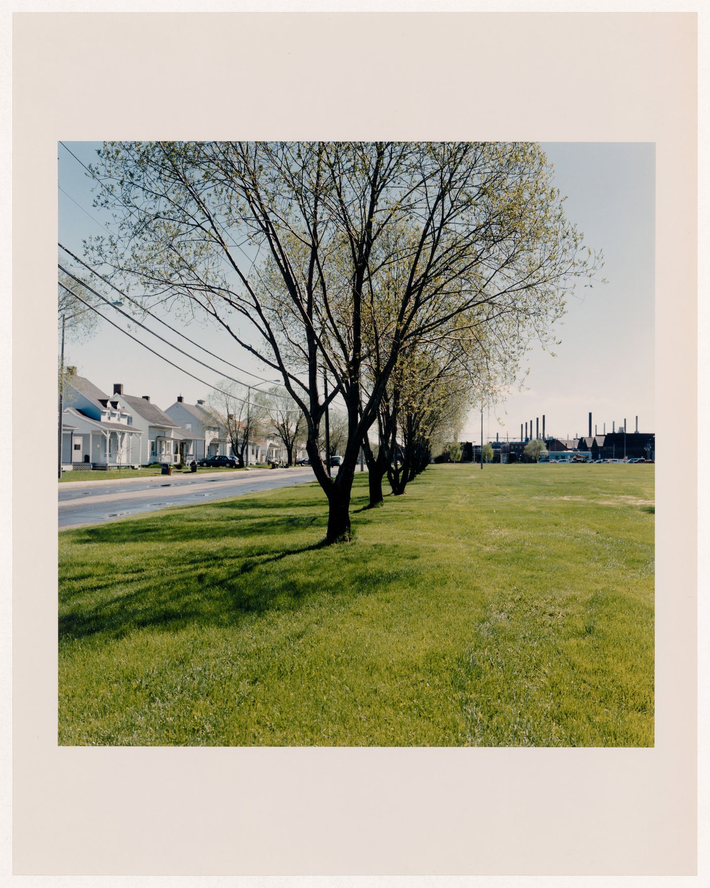 View of a park and rue Moritz, looking east toward the Alcan smelter, district of Sainte-Thérèse d'Arvida